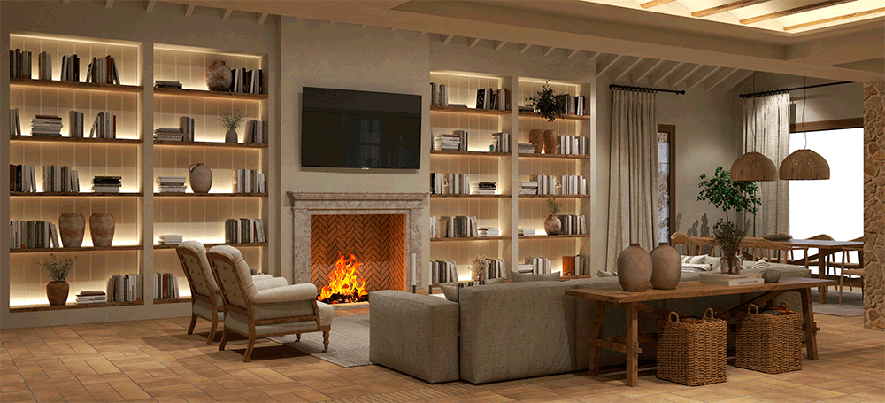 Masía El Portell: salón con chimenea entre librerías iluminadas y sofás junto a la mesa de comedor